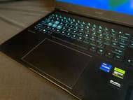 The keyboard features per-key RGB illumination and a super-sized trackpad (Image via Sportskeeda)