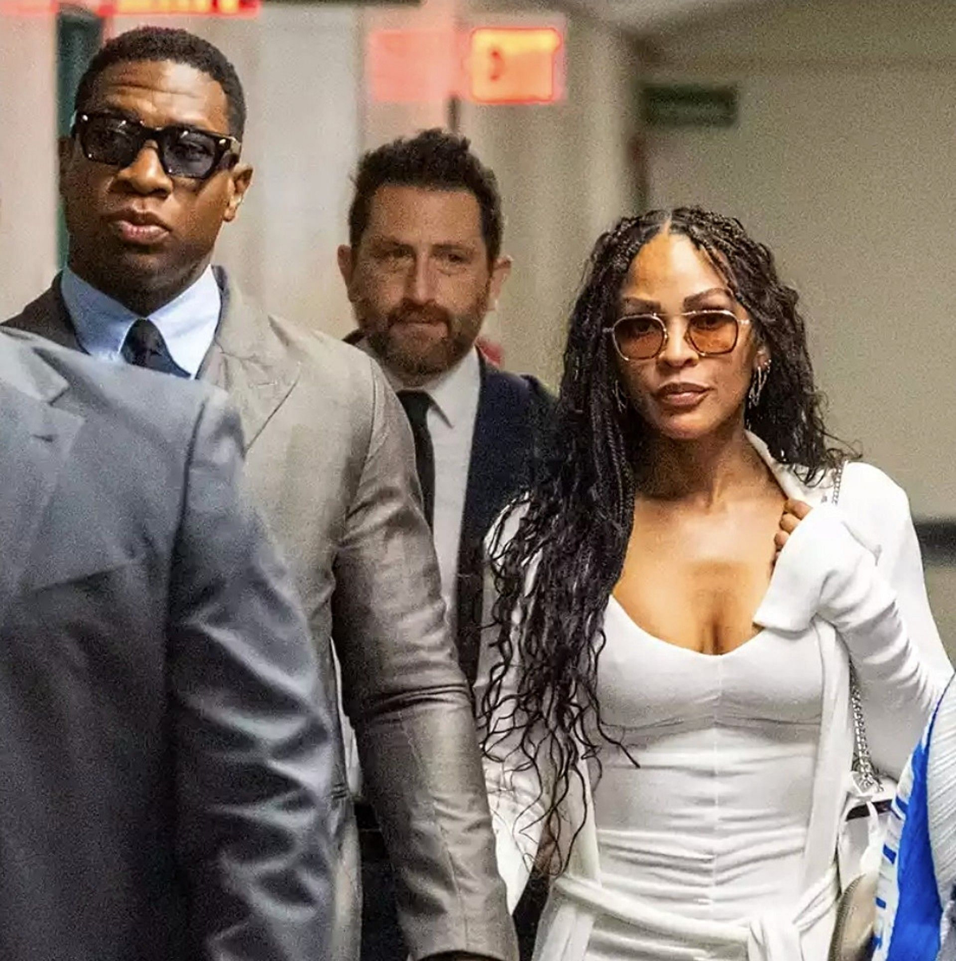 Jonathan Majors and Meagan Good arriving at the former&#039;s pre-trial hearing in August 2023 (Image via People)