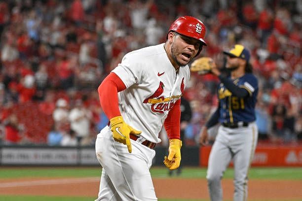 Willson Contreras of the St. Louis Cardinals reacts after hitting a solo home run against the Milwaukee Brewers at Busch Stadium on September 18,...