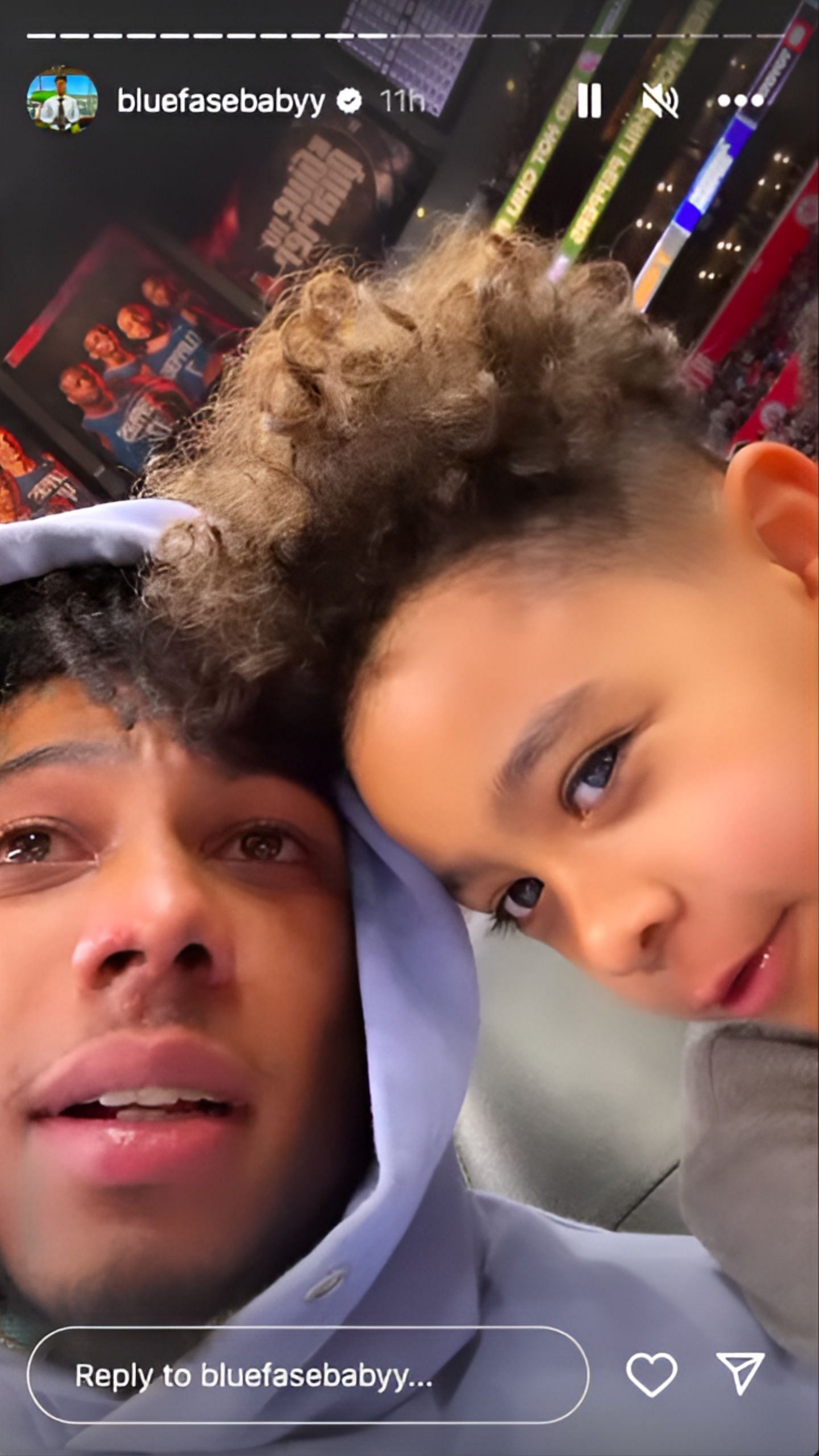 Blueface attending NBA game with his son