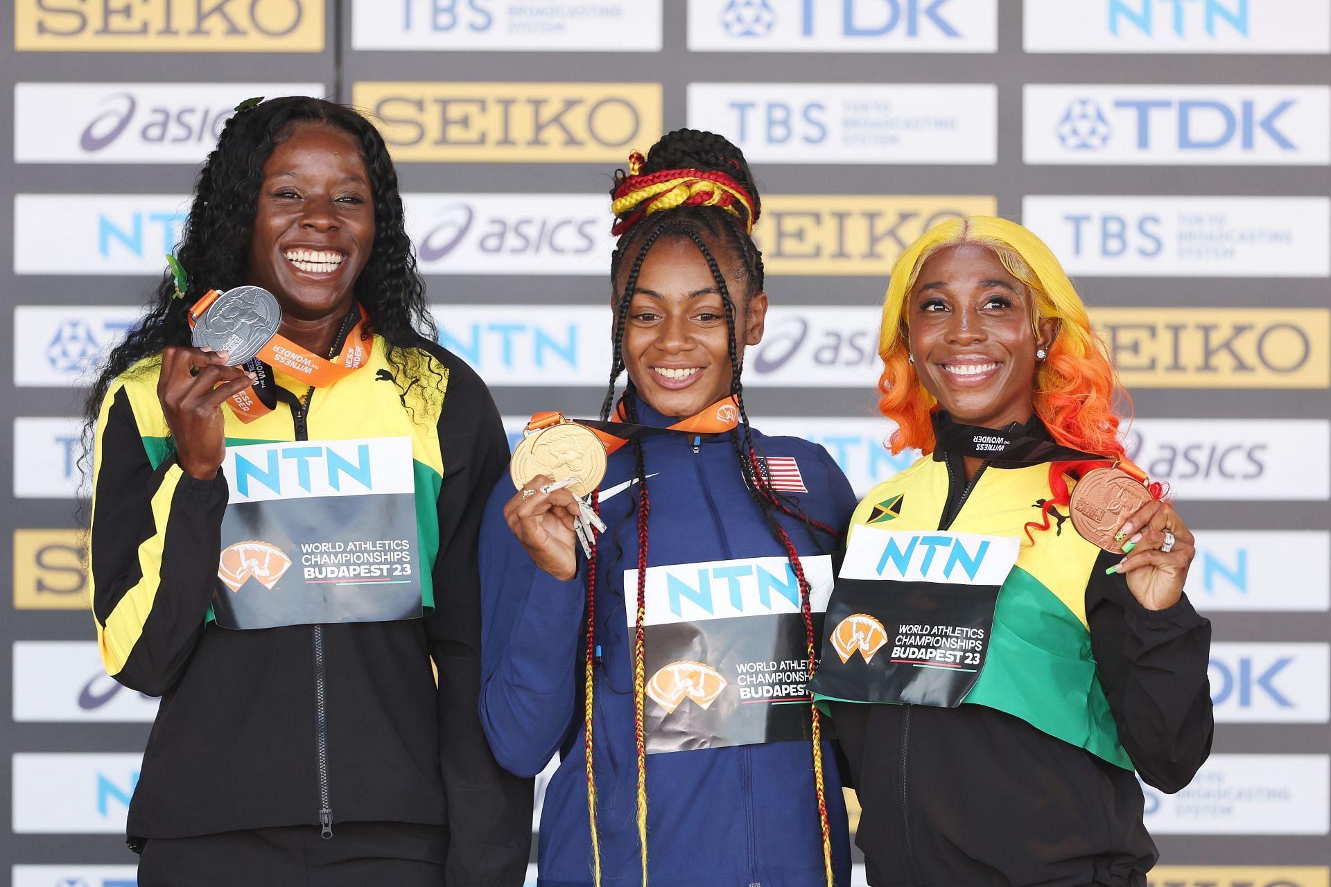 Silver medalist Shericka Jackson, Gold medalist Sha&#039;Carri Richardson, and Bronze medalist Shelly-Ann Fraser-Pryce pose for a photo during the medal ceremony for the Women&#039;s 100m during the World Athletics Championships 2023 in Budapest, Hungary.