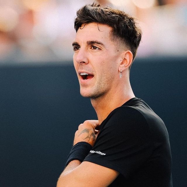How tall is Thanasi Kokkinakis?