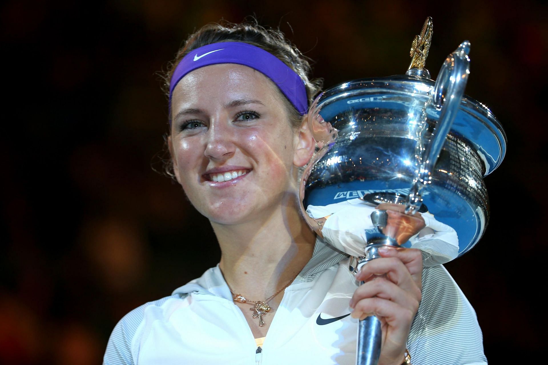 Victoria Azarenka poses with the 2013 Australian Open trophy