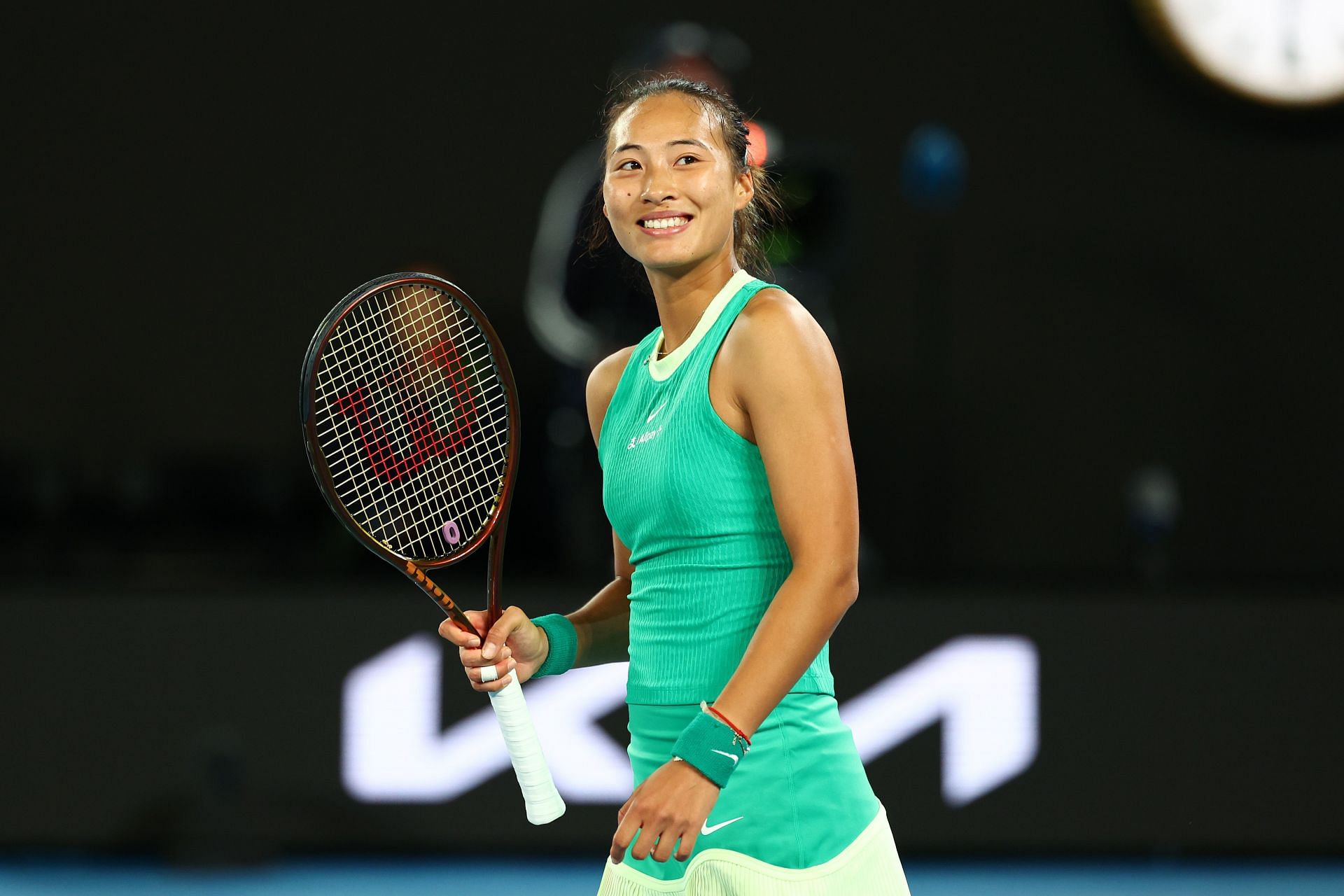 Zheng Qinwen reacts after reaching the last eight at the 2024 Australian Open