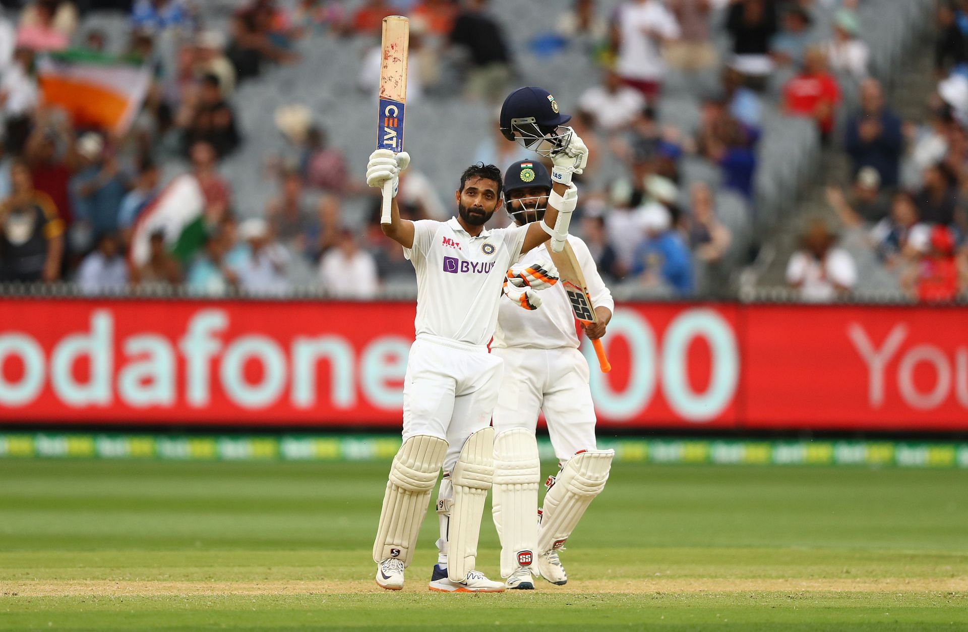 Rahane raises his bat after scoring a century in the second Test of the 2020-21 tour. (Pic: Getty)