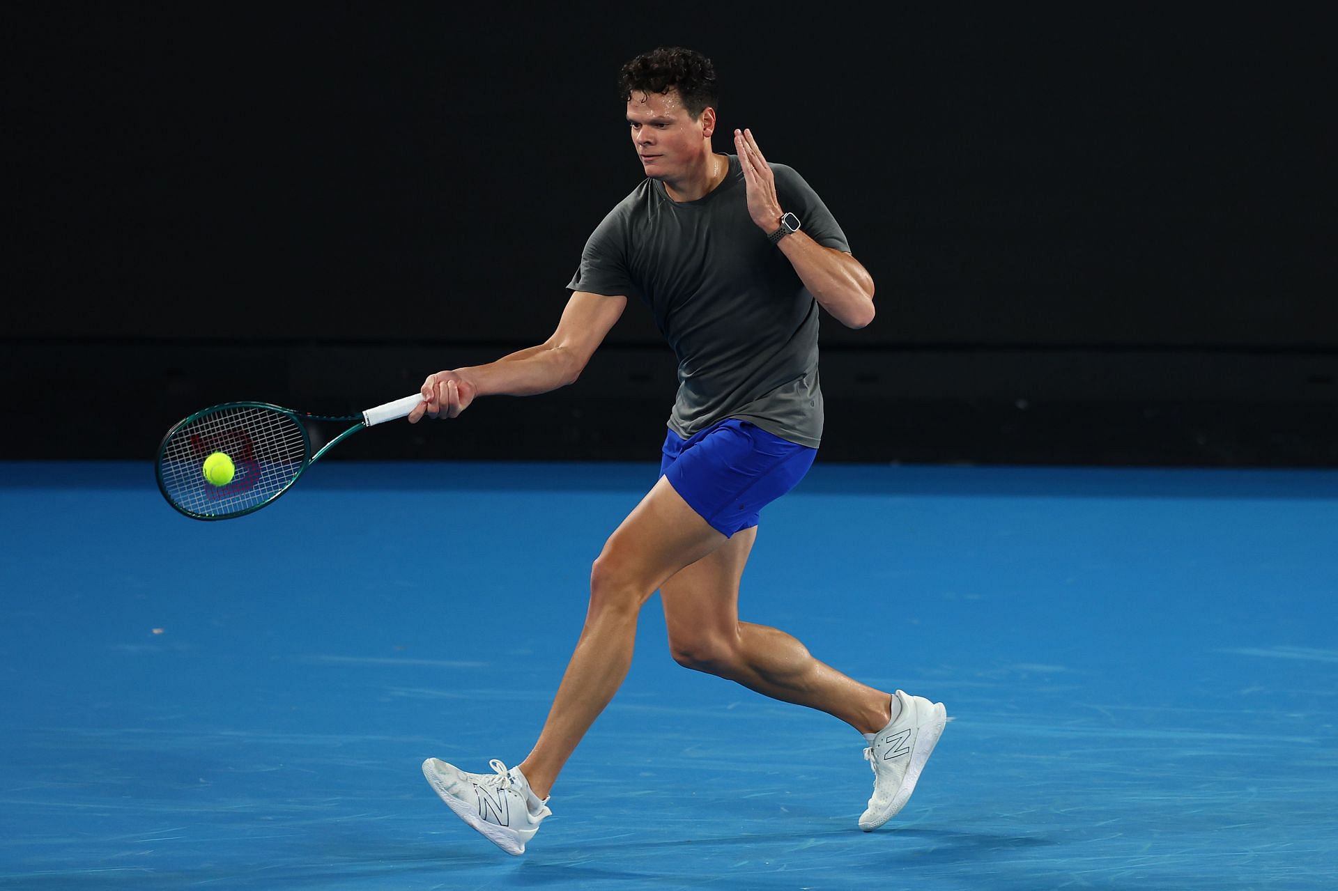 Milos Raonic practices ahead of the 2024 Australian Open at Melbourne Park - Getty Images
