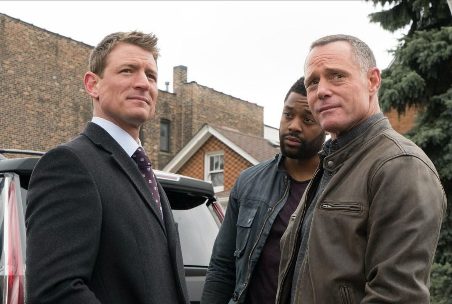 Jason Beghe, Philip Winchester, and LaRoyce Hawkins in a scene from Chicago P.D. (Image via IMDb)