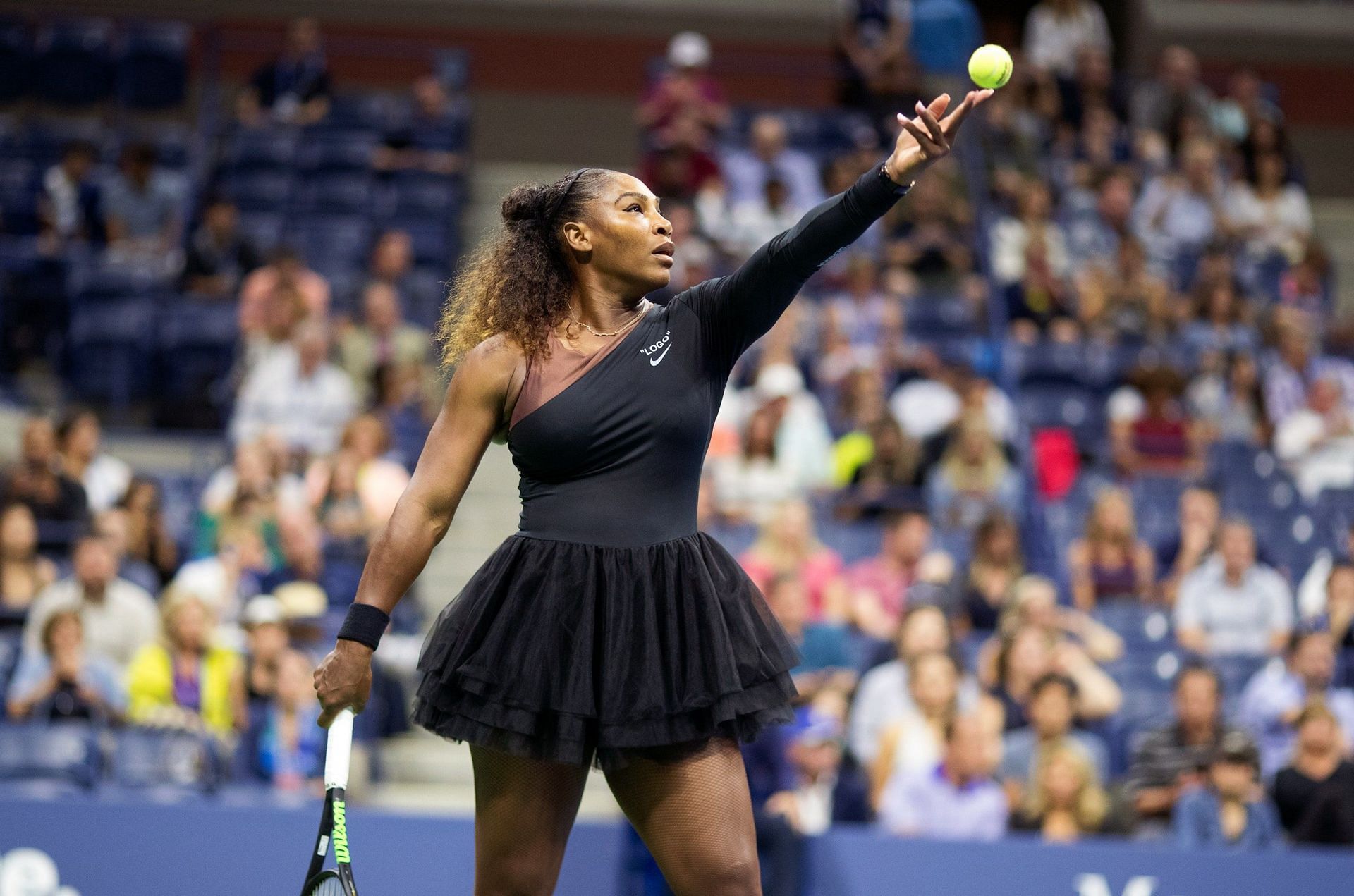 Serena Williams prepares to serve at the 2018 US Open.