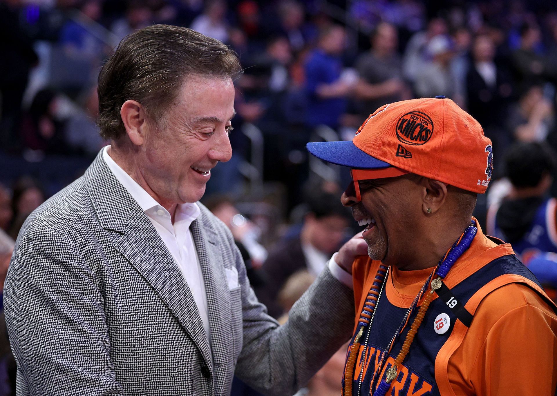 Rick Pitino, shown here with Spike Lee, lost one of the longest college basketball games in history in 2013.