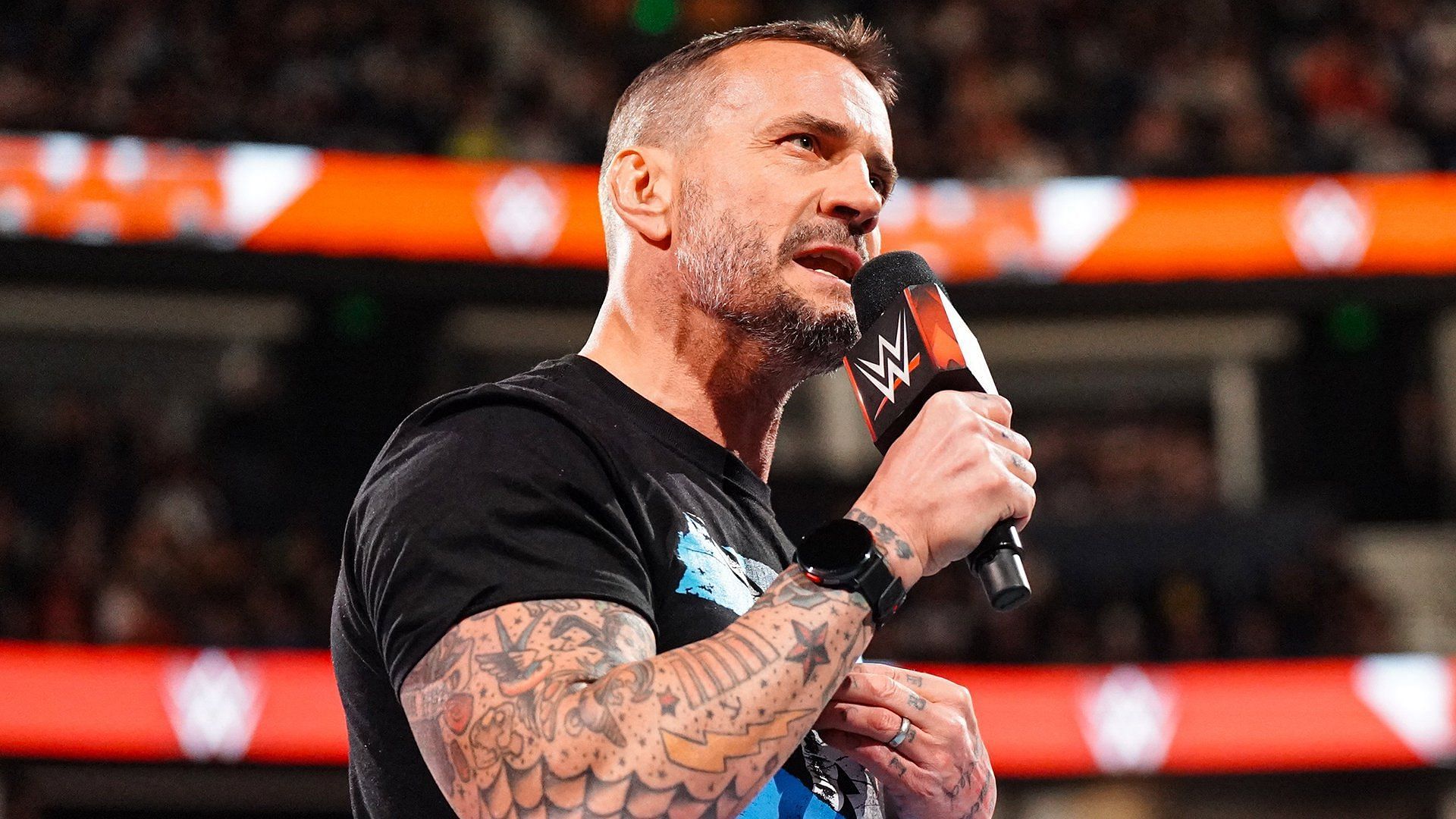 CM Punk speaks from the WWE RAW ring