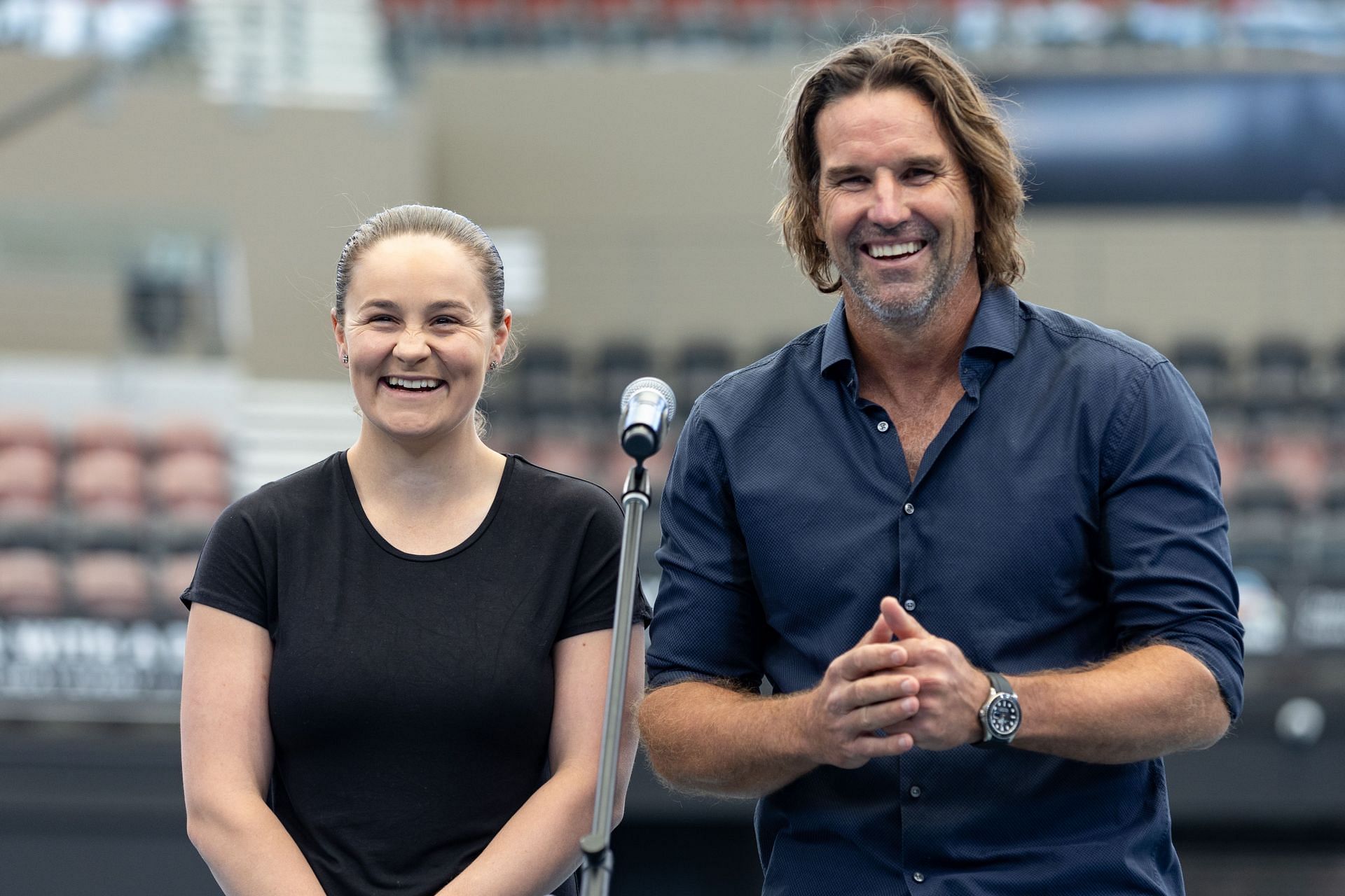 Ashleigh Barty with Patrick Rafter at Brisbane in 2023