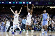 Kansas celebrates after rallying from 15 down at halftime to win the NCAA title.