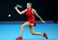 Sabalenka strikes the ball at the 2024 Australian Open.