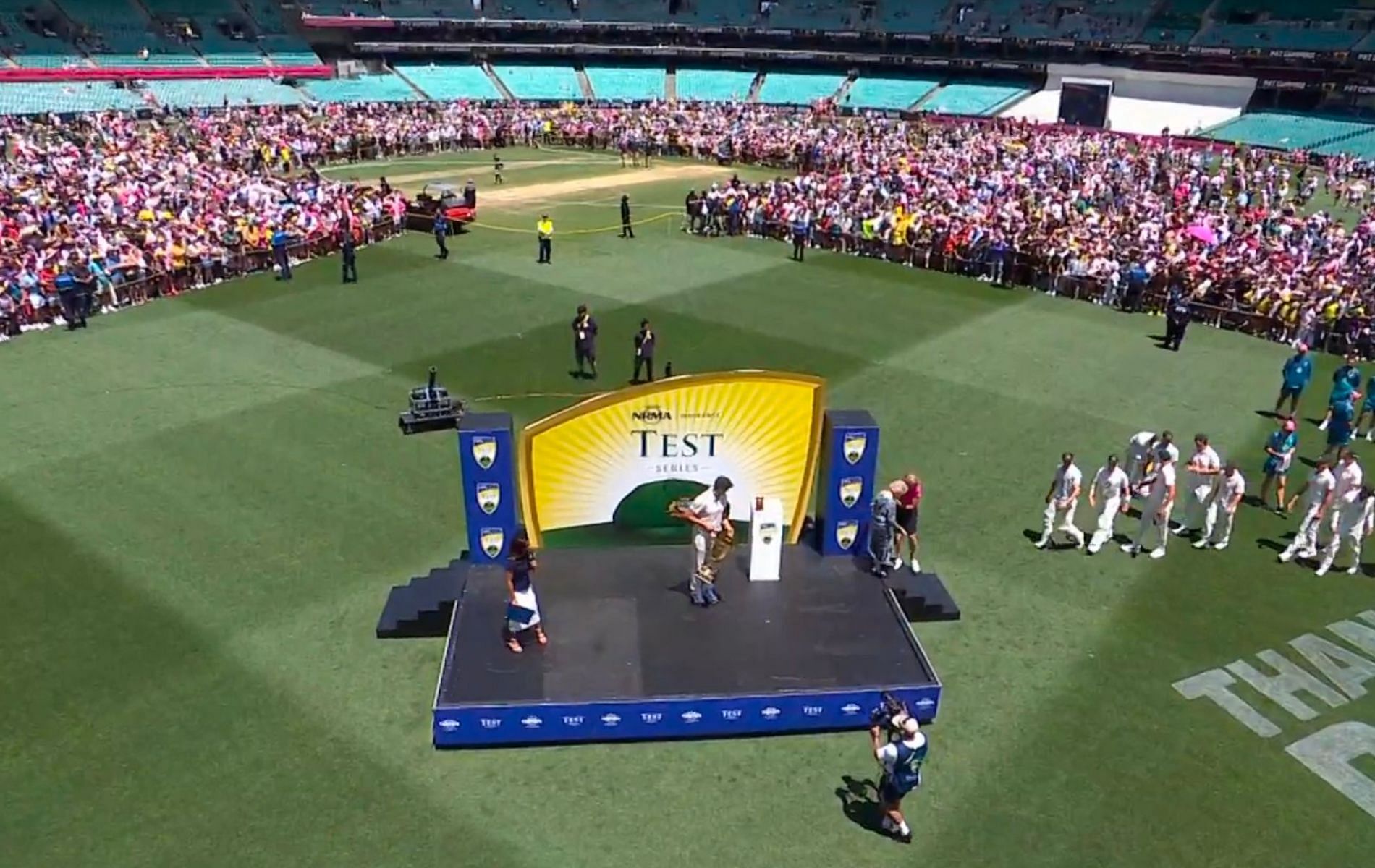 Fans at the SCG entered the field during the post-match presentation. (Pic: X)
