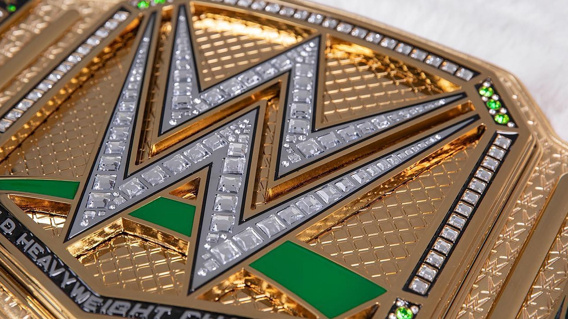 A custom WWE gold championship logo on display