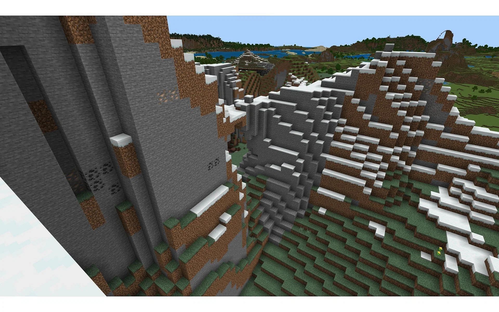 In the distance, Minecraft players will spy a snowy mountain filled with deep caves (Image via Mojang)