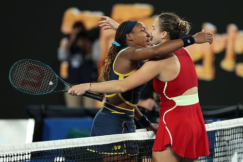 Coco Gauff (left) hugs Aryna Sabalenka at the net.