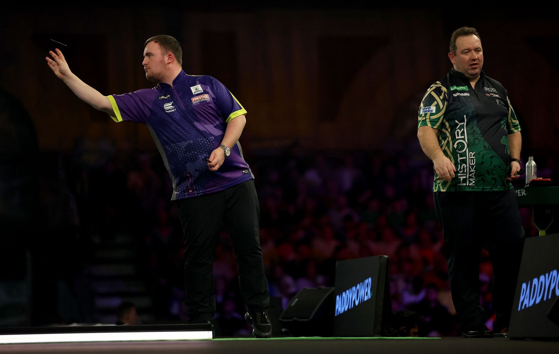 Luke Littler beats opponent Brendan Dolan to qualify for the semi-finals of the World Darts Championship (Image via Getty Images)