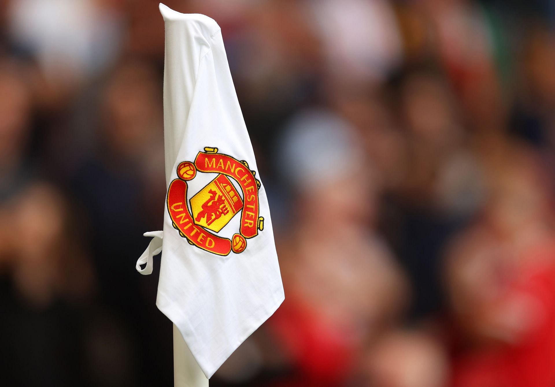 Manchester United badge (via Getty Images)