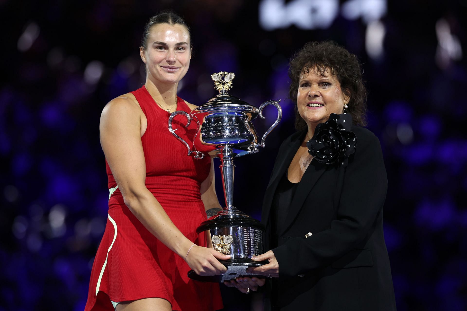 Aryna Sabalenka poses with the 2024 Australian Open trophy