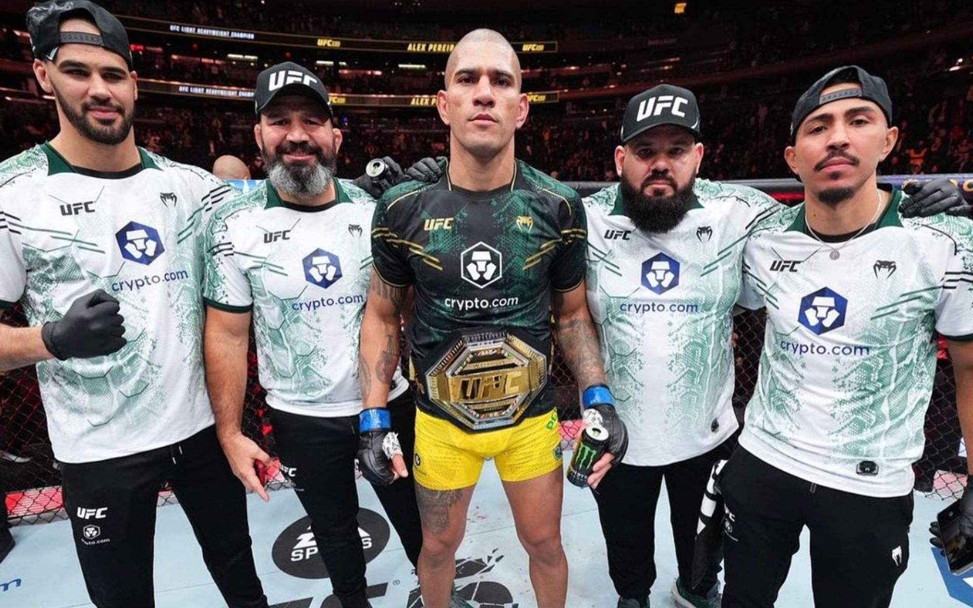 Alex Pereira (center) after winning the light heavyweight belt [Photo Courtesy @alexpoatanpereira on Instagram]