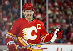 WATCH: Calgary Flames' Mikael Backlund left in tears after surprise locker room visit by family to celebrate momentous milestone