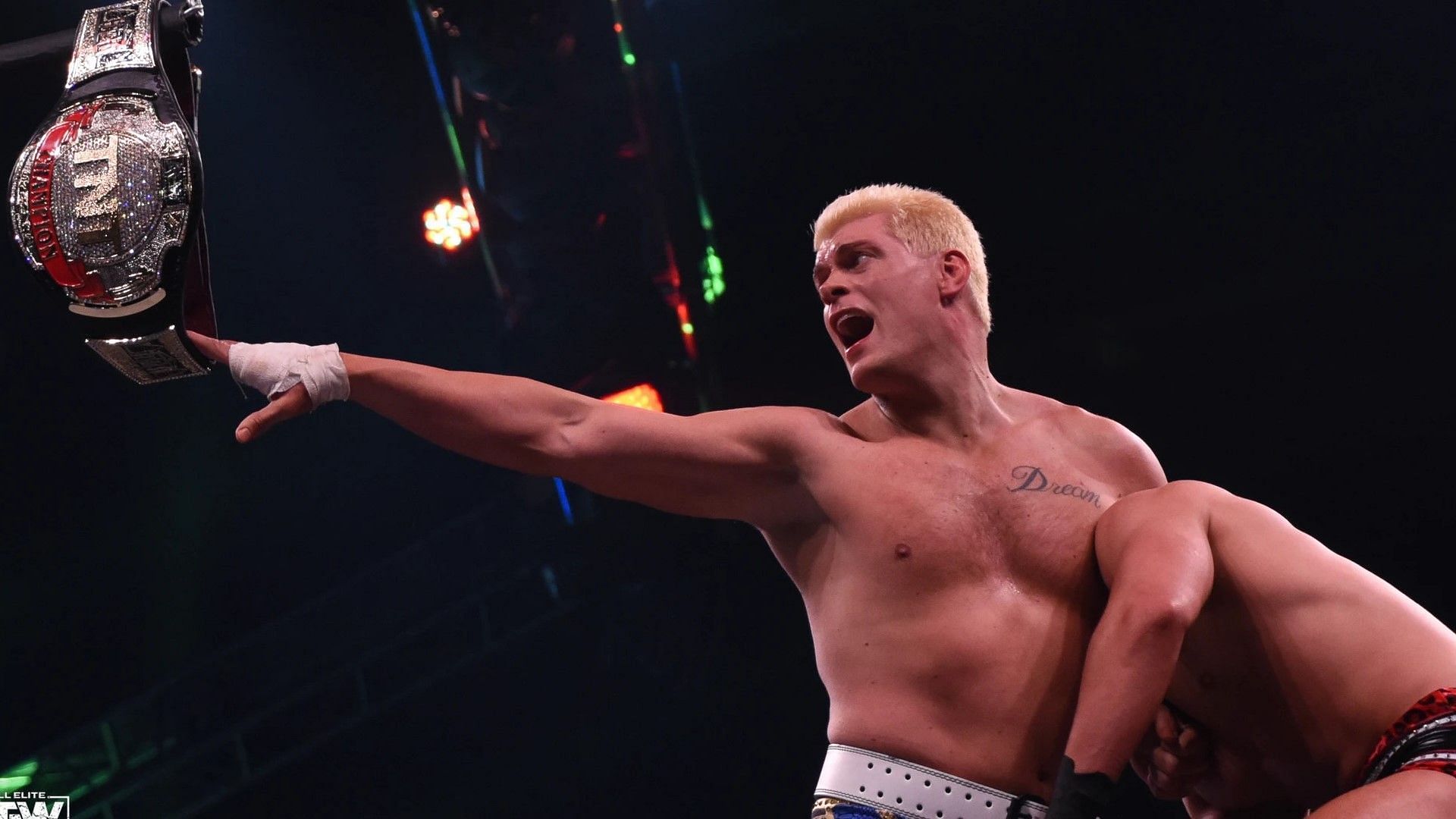 Cody Rhodes reaches for the AEW TNT Championship in his last match