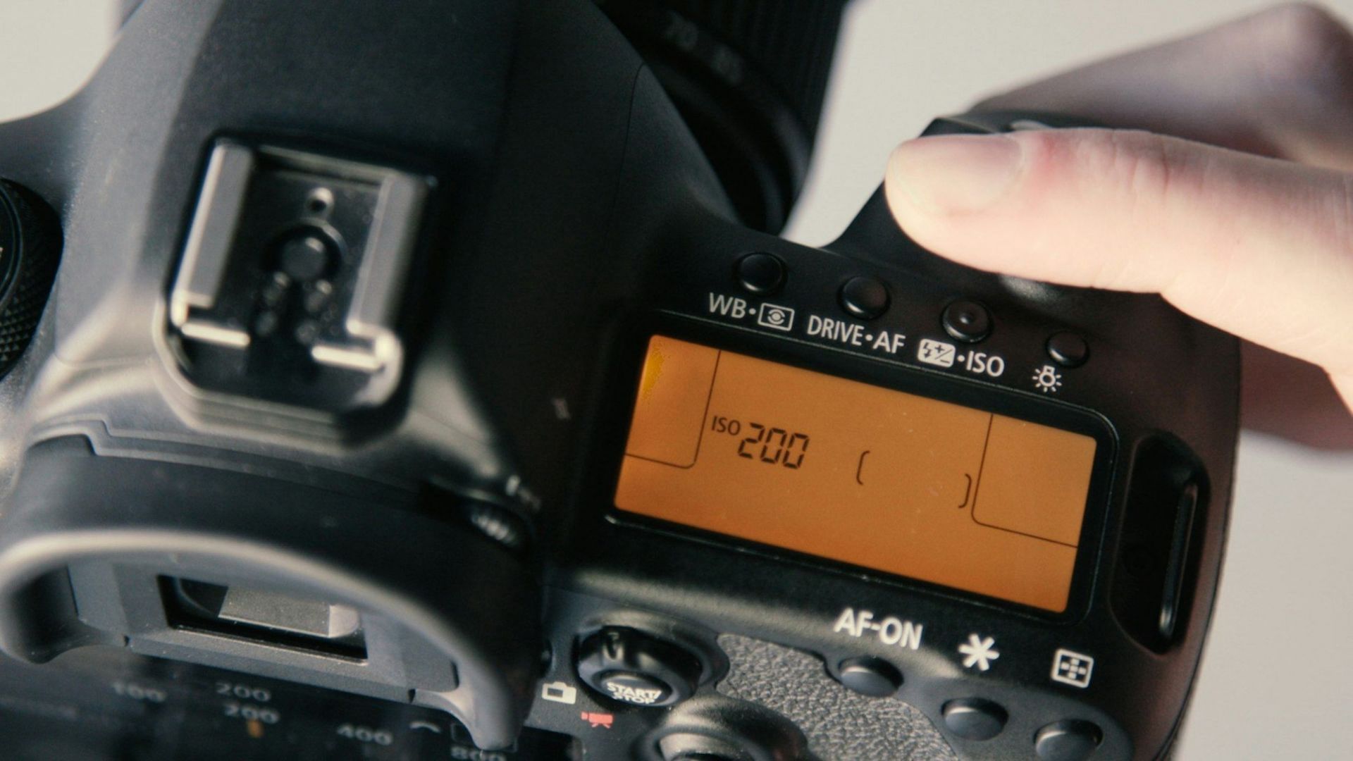 ISO settings on a DSLR (Image via Unsplash/@sharegrid)