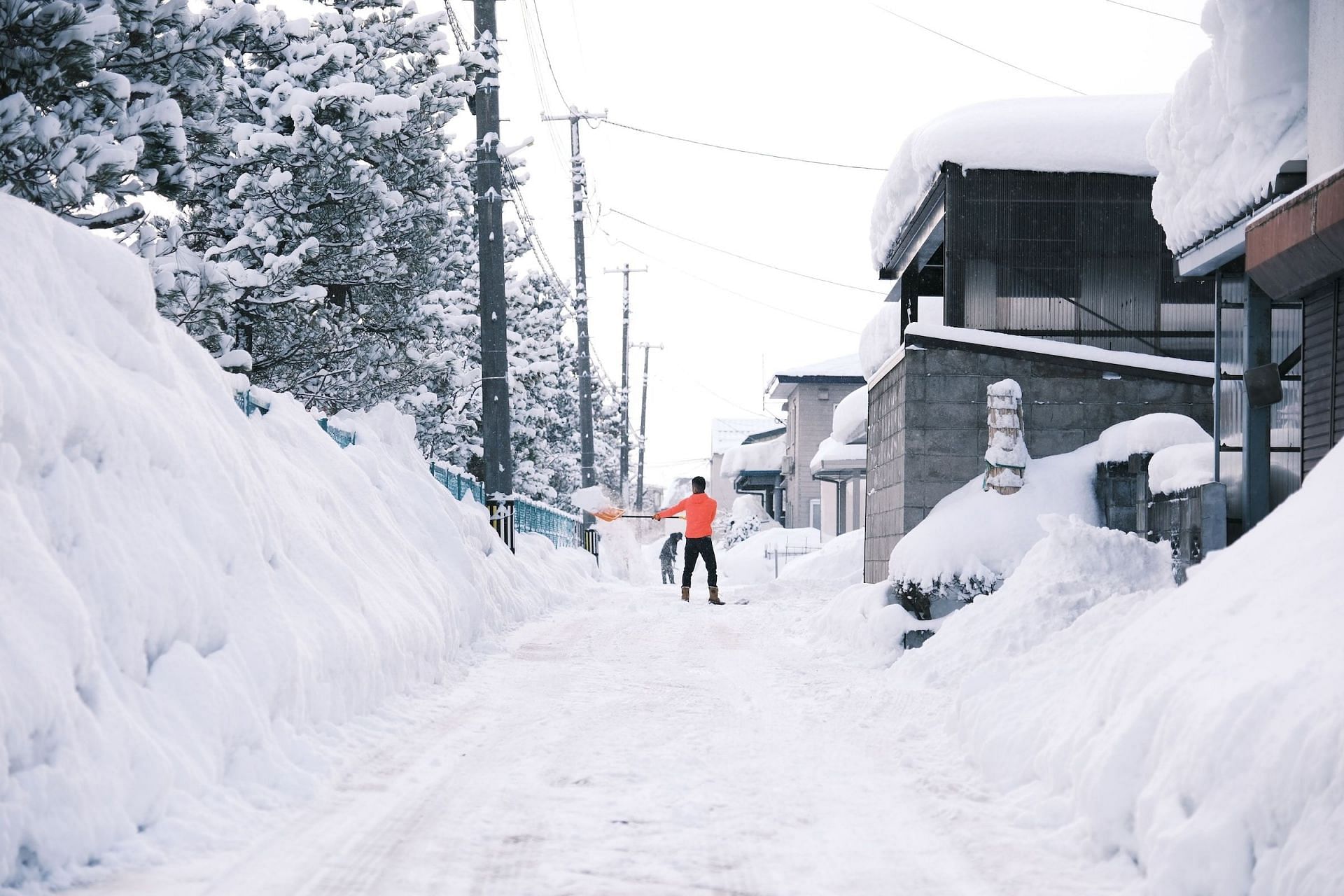 Snow shoveling (Image via Unsplash/Seiya Maeda)