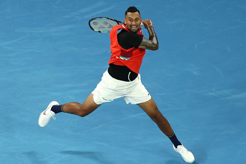 Nick Kyrgios hits a forehand at the 2022 Australian Open