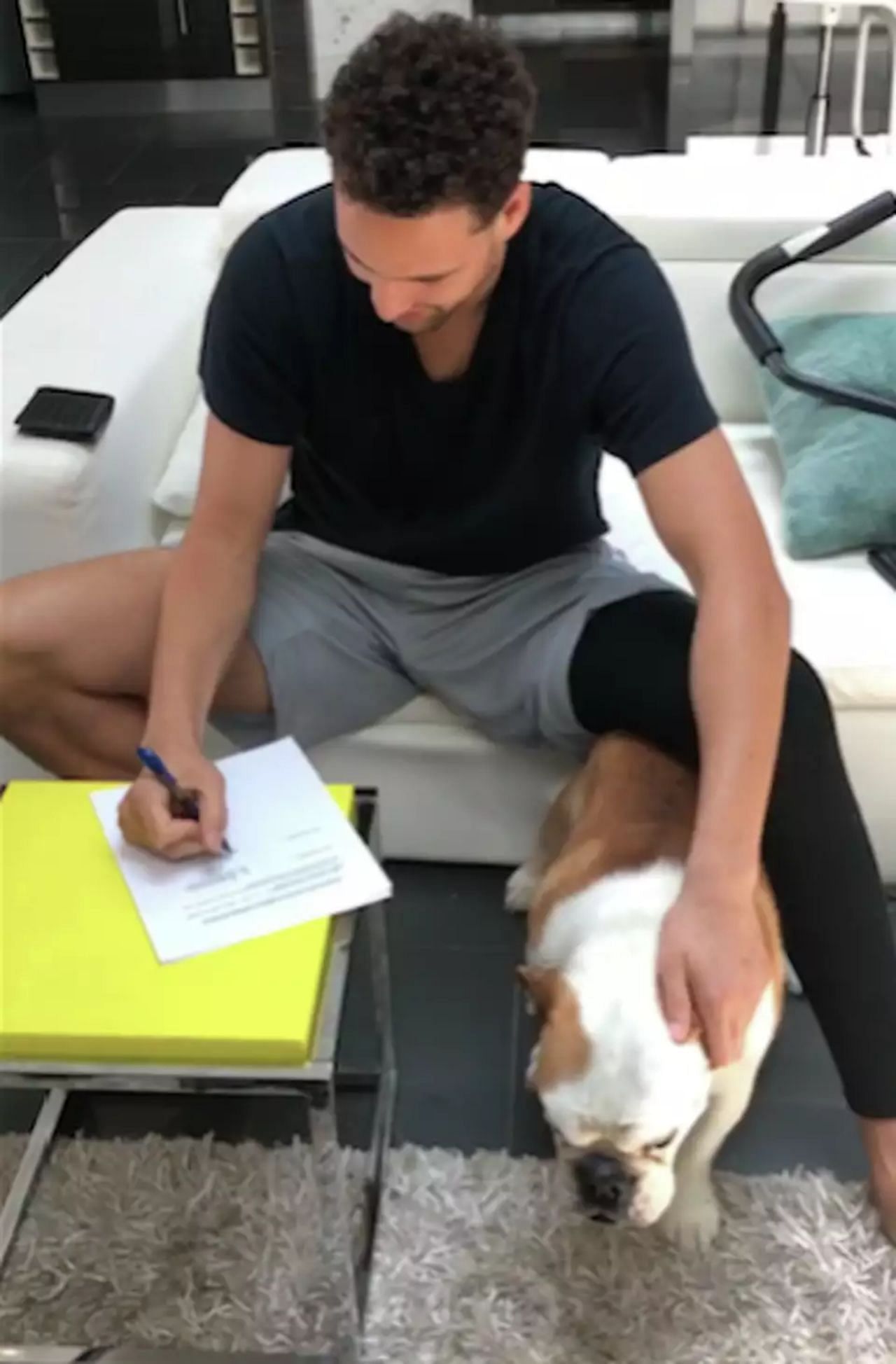 Thompson with Rocco during the paperwork (via sfgate)