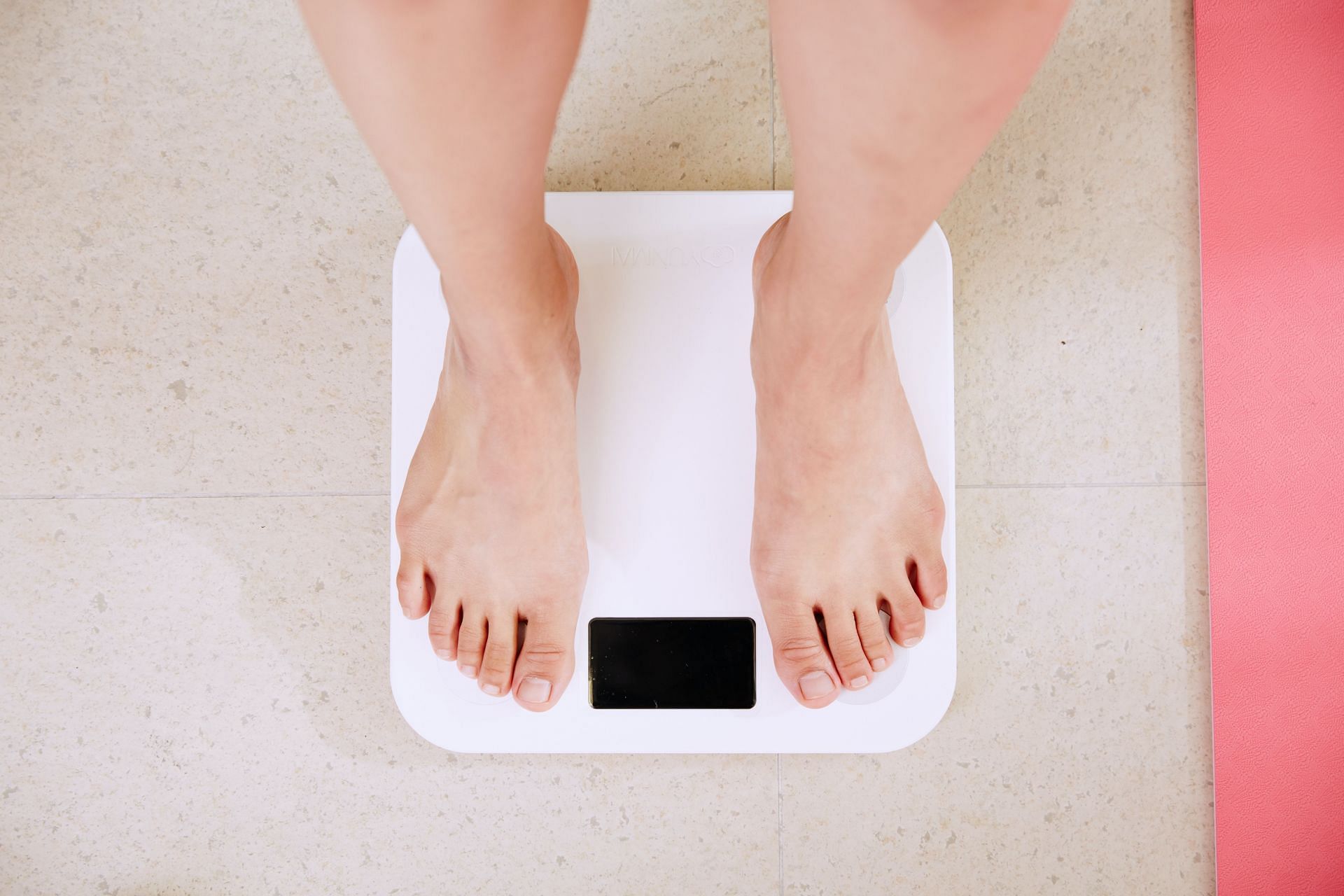 Losing weight can be challenging (Image via Unsplash/ i yunmai)