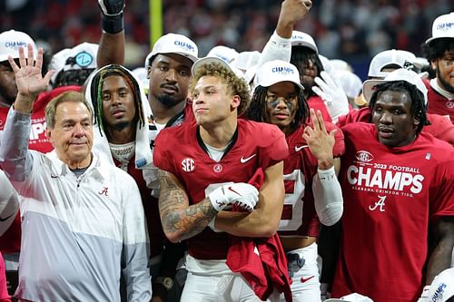 2023 SEC Championship: Georgia vs. Alabama: Atlanta, Georgia, December 02: Head coach Nick Saban and Jermaine Burton #3 of the Alabama Crimson Tide celebrate after defeating the Georgia Bulldogs 27-24 in the SEC Championship at Mercedes-Benz Stadium on December 02, 2023, in Atlanta, Georgia. (Photo by Kevin C. Cox/Getty Images) )