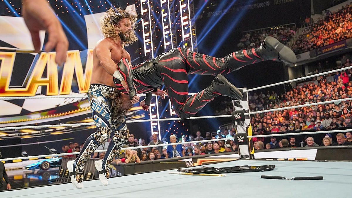 Seth Rollins punishes Shinsuke Nakamura during a title defense.