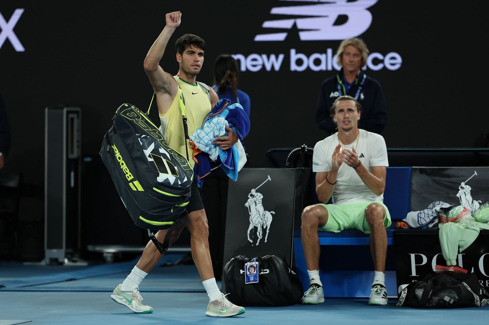 Carlos Alcaraz waves to the crowd after exiting the 2024 Australian Open