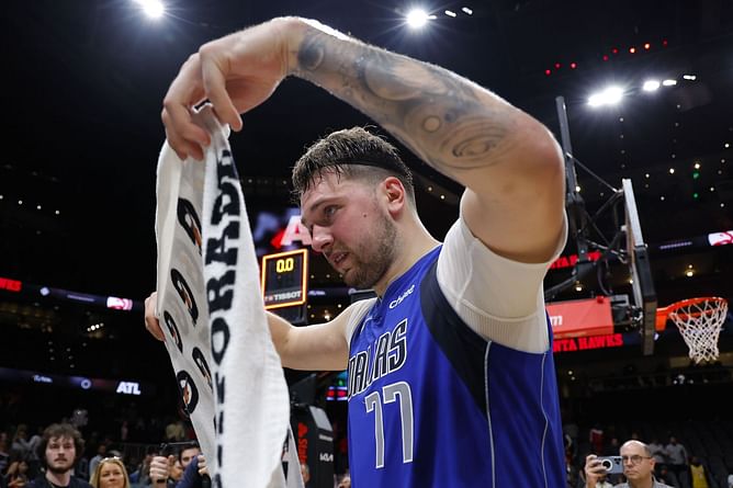 Watch: Hawks superfan rapper Boosie Badazz gets a Luka Doncic jersey signed after career-high 73 points in Atlanta