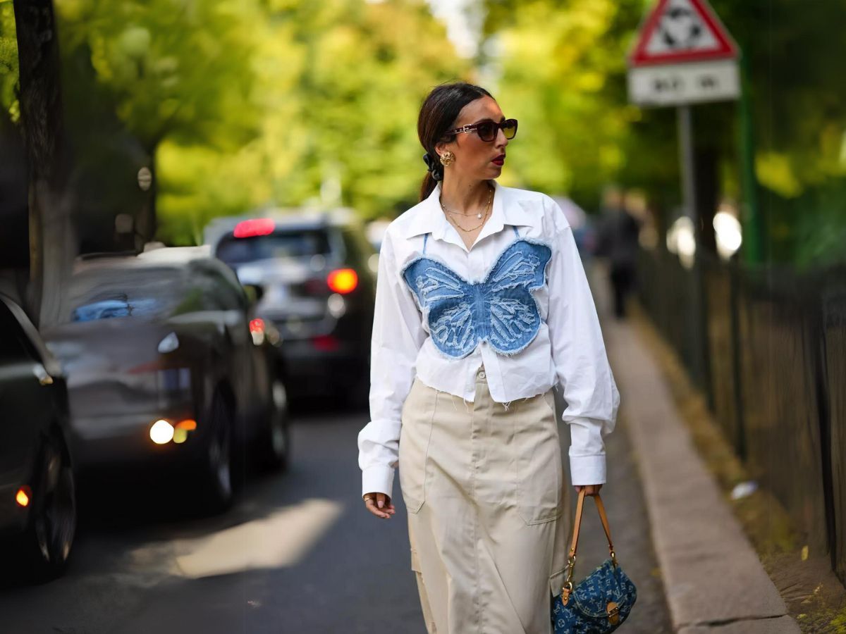 Over a Button-Down Shirt (Image via Getty)