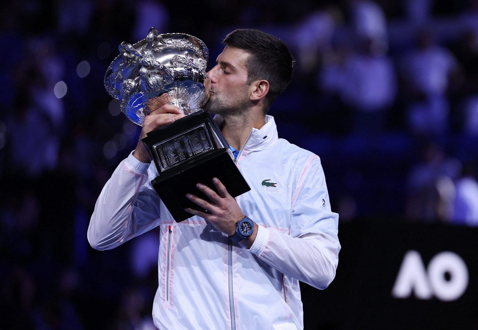 Novak Djokovic kisses the Norman Brookes Challenge Cup