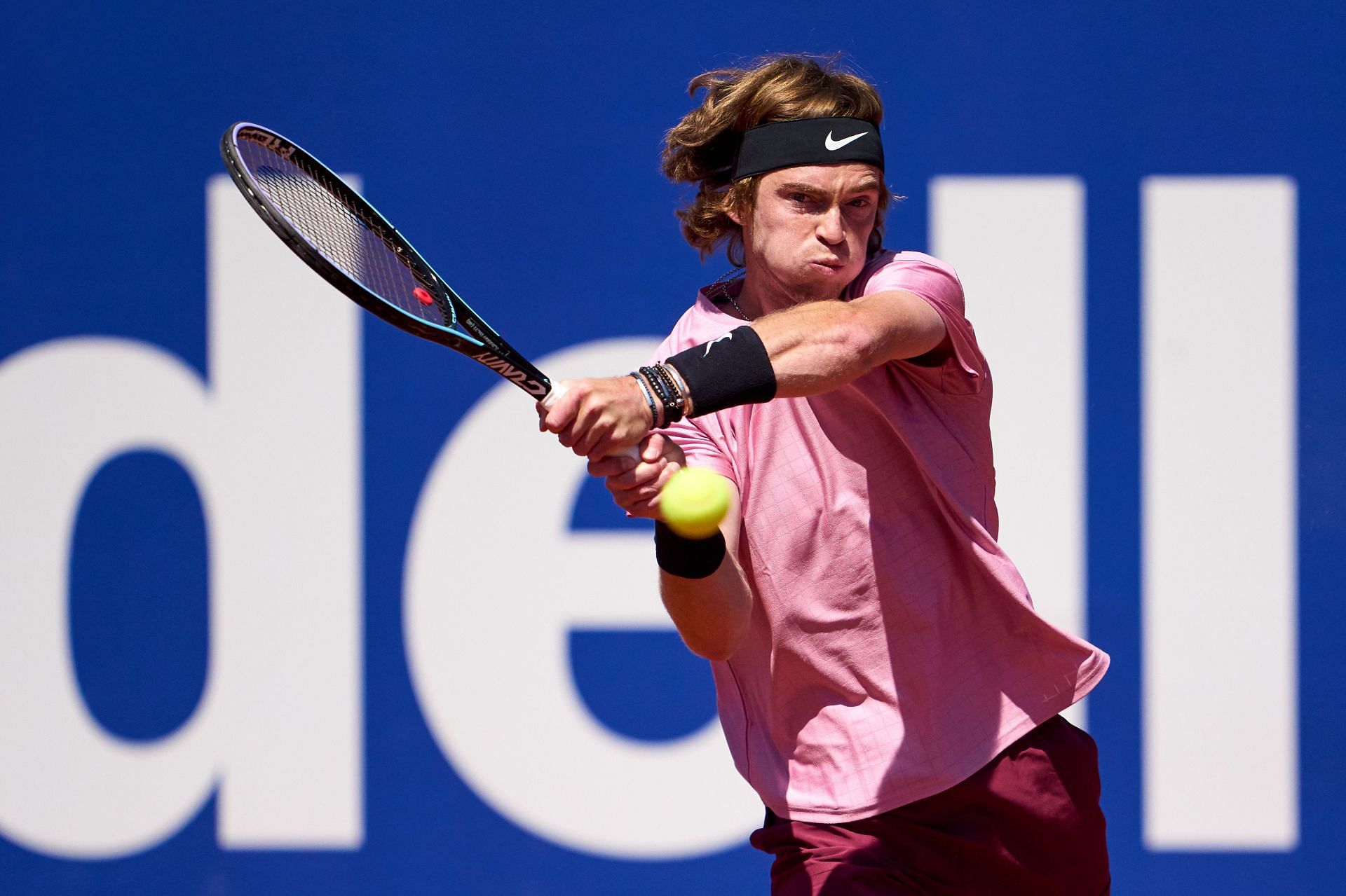 Andrey Rublev plays a shot