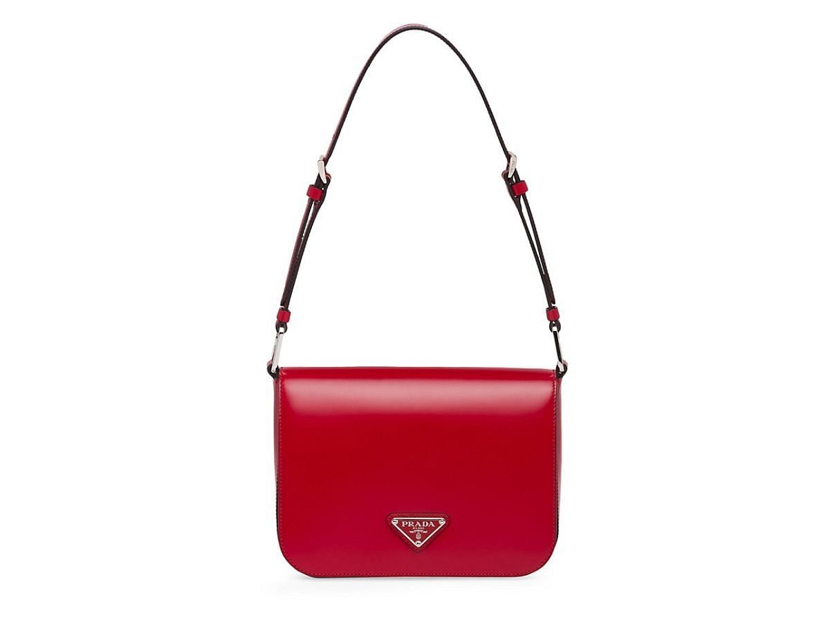 Best red handbags to gift her this Valentine&#039;s Day- Prada Brushed Leather Shoulder Bag - $4,099.426 (Image via Saks Fifth Avenue )