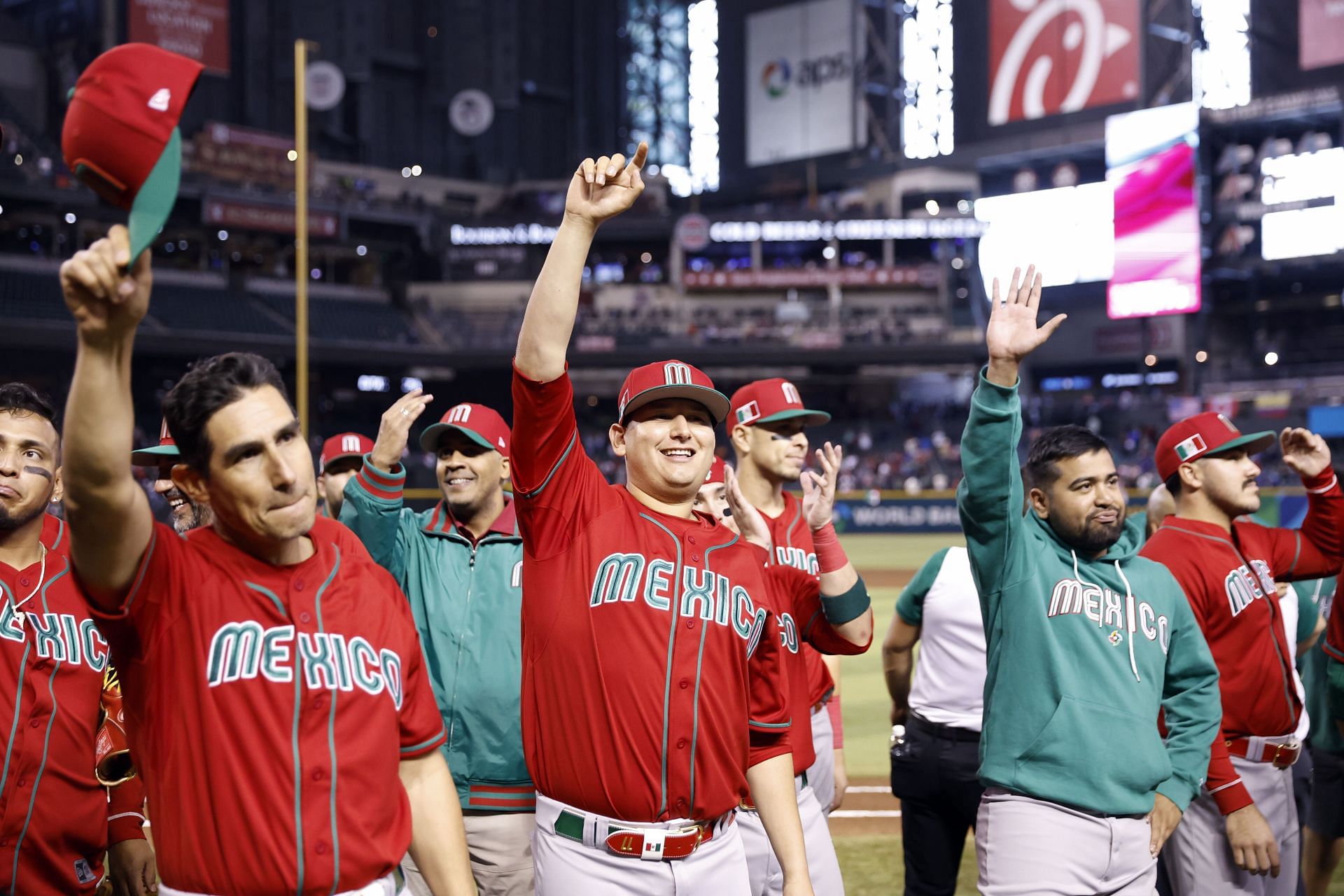 Pitcher Javier Assad #77 of Team Mexico (C) acknowledges the crowd after Mexico defeated Team Canada 10-3 during the World Baseball Classic Pool C game at Chase Field on March 15, 2023