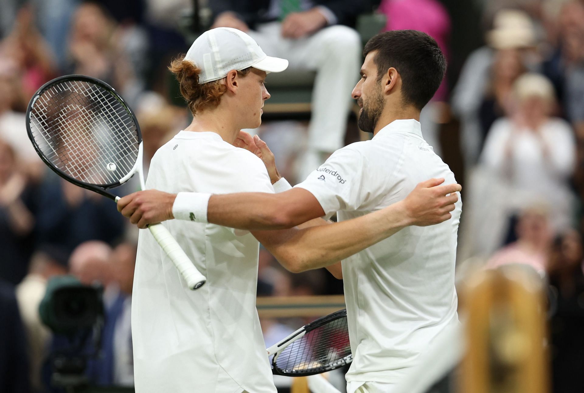 Jannik Sinner (L) and Novak Djokovic