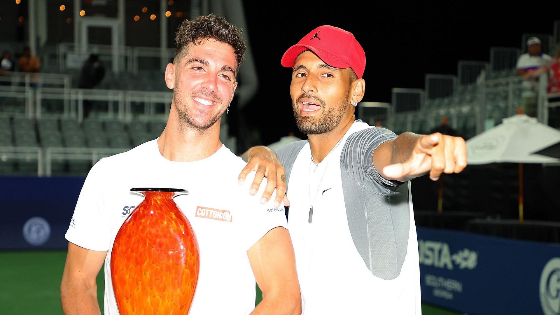 Nick Kyrgios and Thanasi Kokkinakis pose with the 2022 Atlanta Open doubles trophy