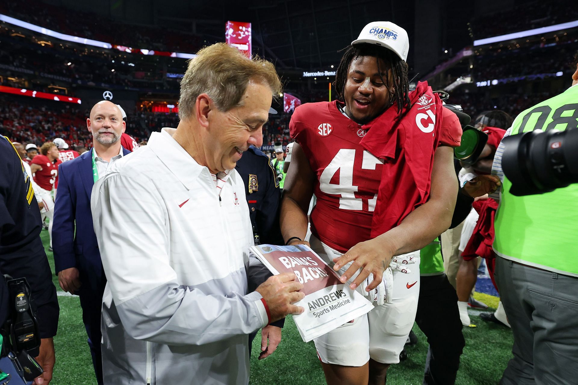 Head coach Nick Saban and James Smith, #47 of the Alabama Crimson Tide, celebrate after defeating the Georgia Bulldogs 27-24 in the SEC Championship at Mercedes-Benz Stadium on December 02, 2023, in Atlanta, Georgia. (Photo by Kevin C. Cox/Getty Images)