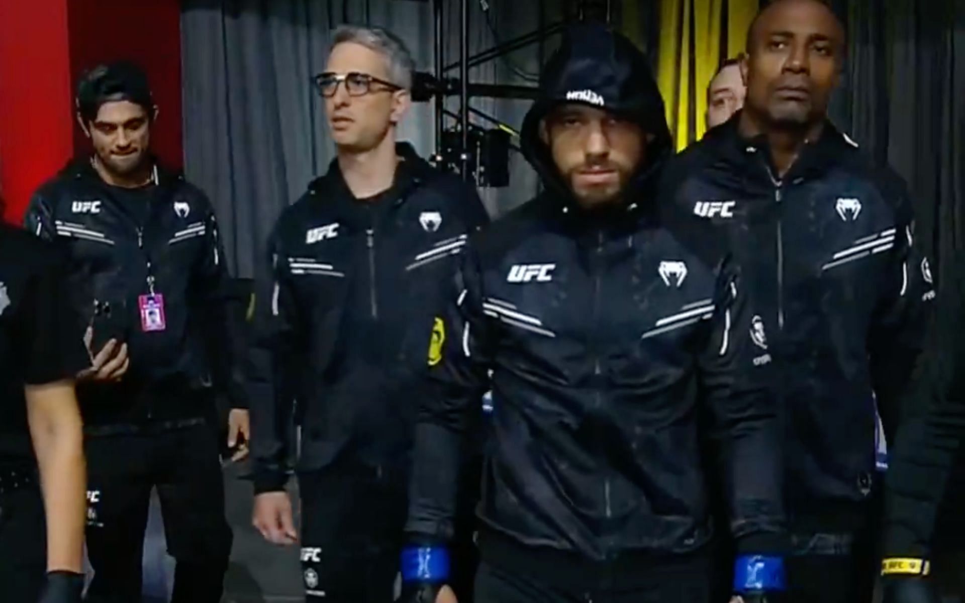 Jean Silva (front) walking out for his UFC debut at UFC Vegas 84 [Photo Courtesy @espnmma on X]