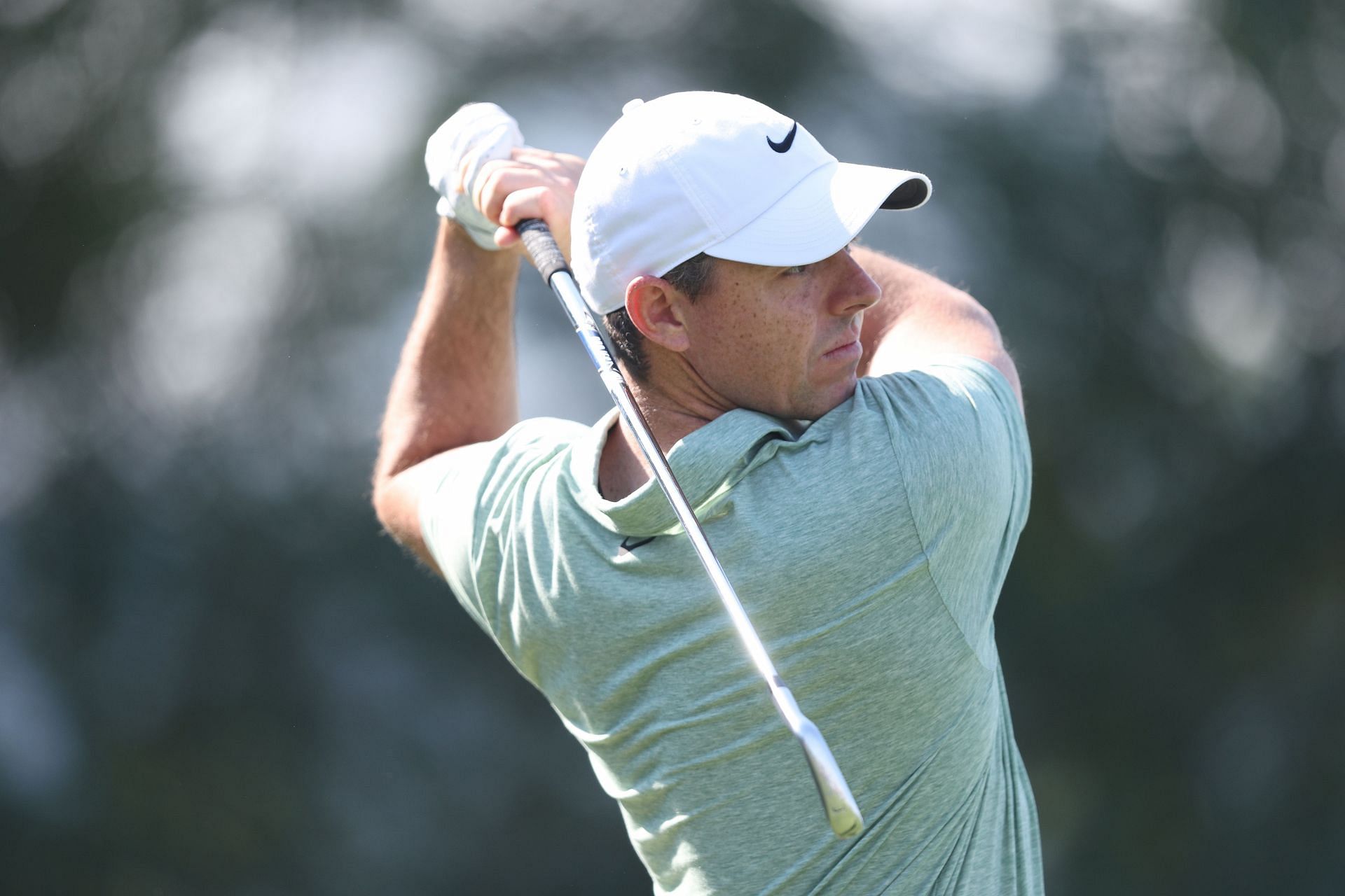 Rory McIlroy tees off on the 17th hole on Day One of the Dubai Invitational 2024