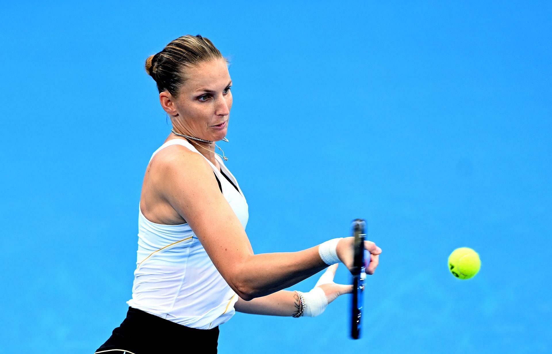 Karolina Pliskova strikes the ball at the 2024 Brisbane International