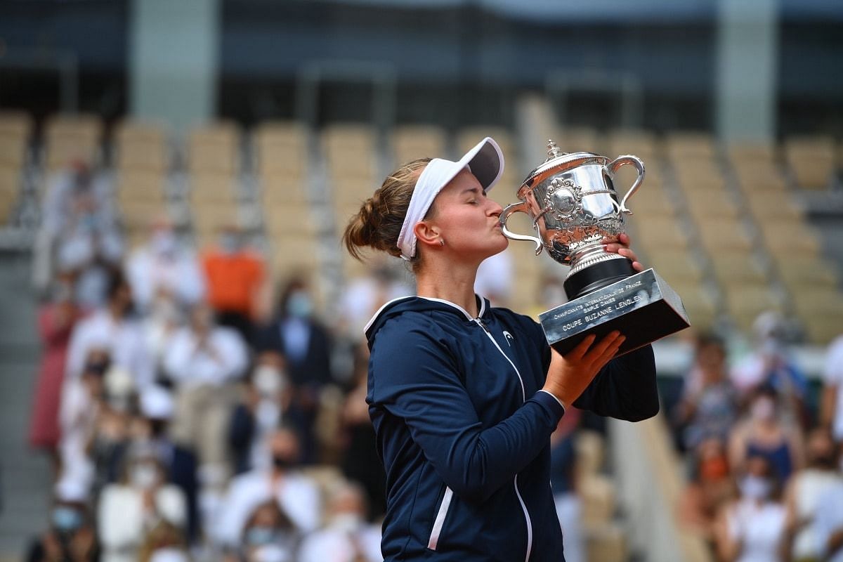 Barbora Krejcikova poses with the 2021 Roland Garros trophy