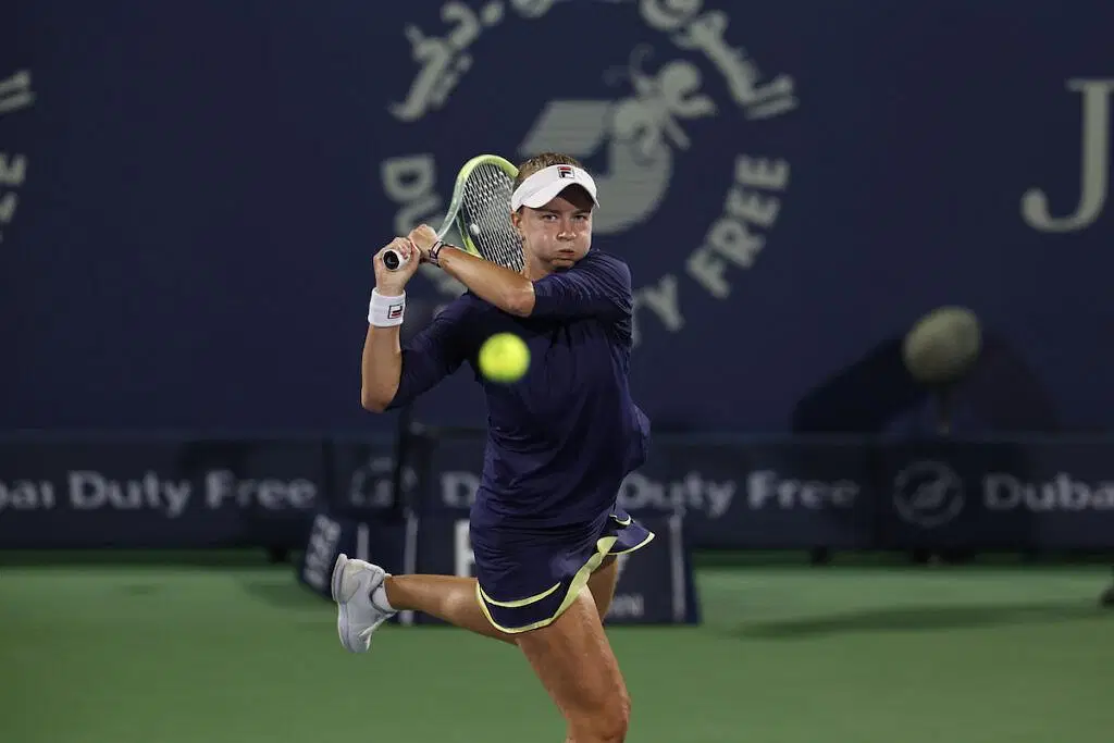 Barbora Krejcikova hits a backhand