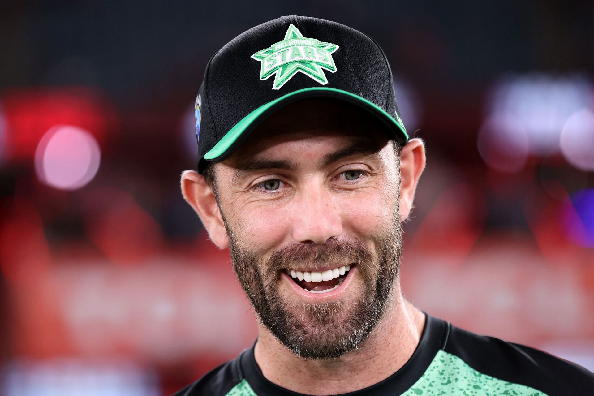 Glenn Maxwell smiling when in action for Melbourne Stars.